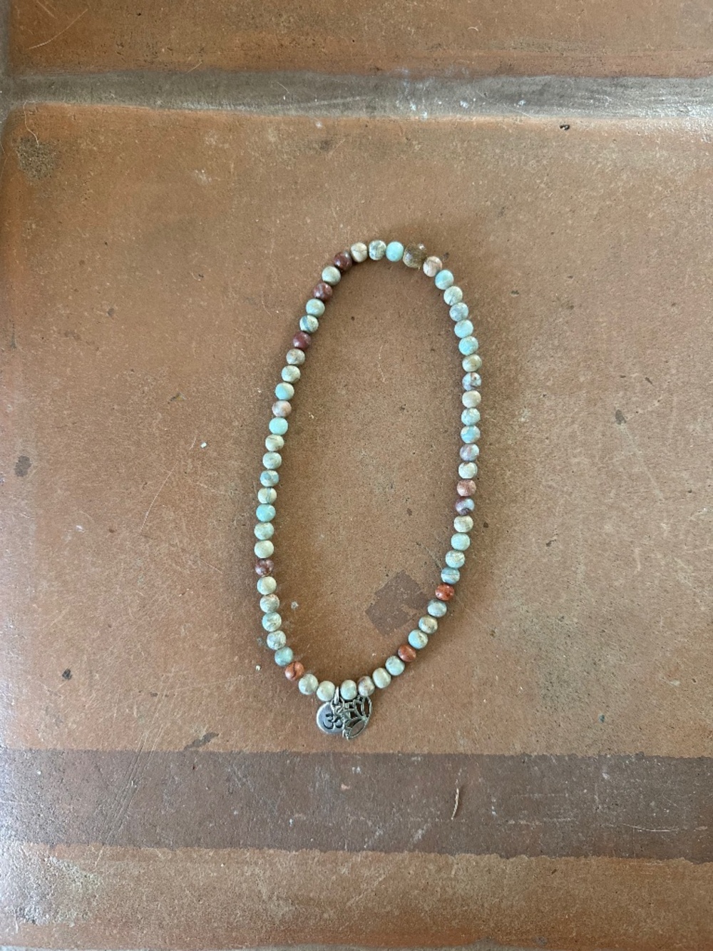 Aqua Om + leaf necklace